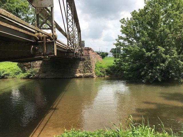View of creek under a bridge