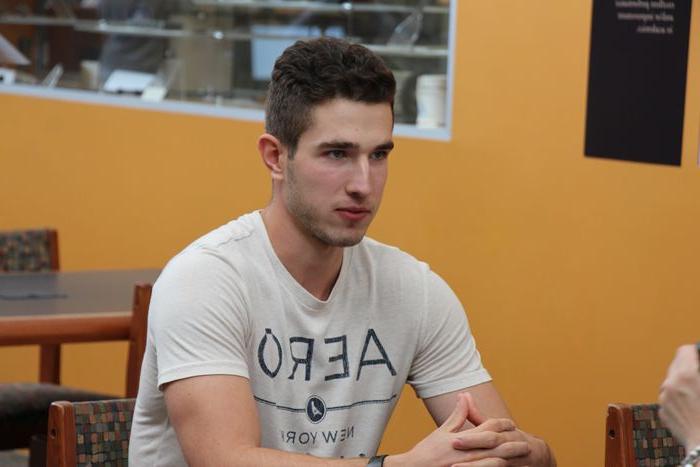 Ilya sitting in the Thun library.