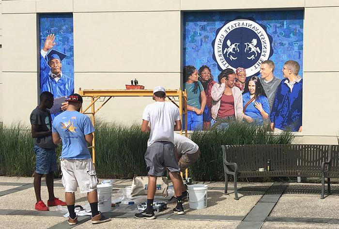 Students helping with the Mural.