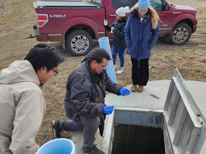 Cheyenne River Tribe member shows students research