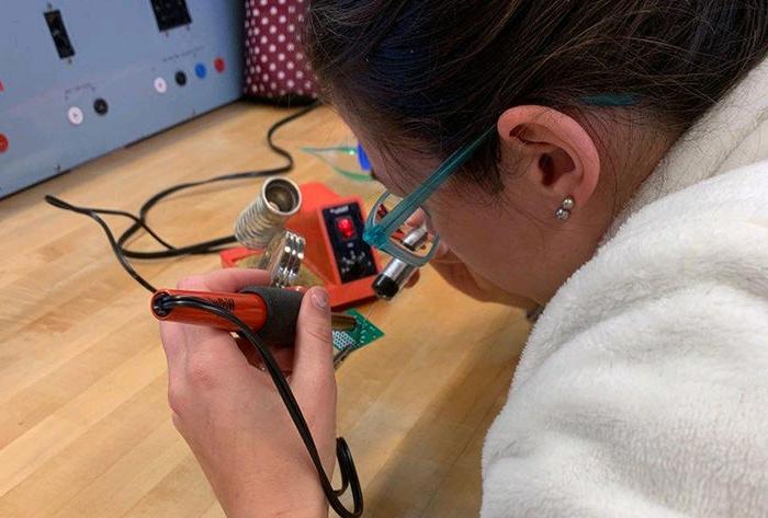 Elizabeth Beller works on a class project. 