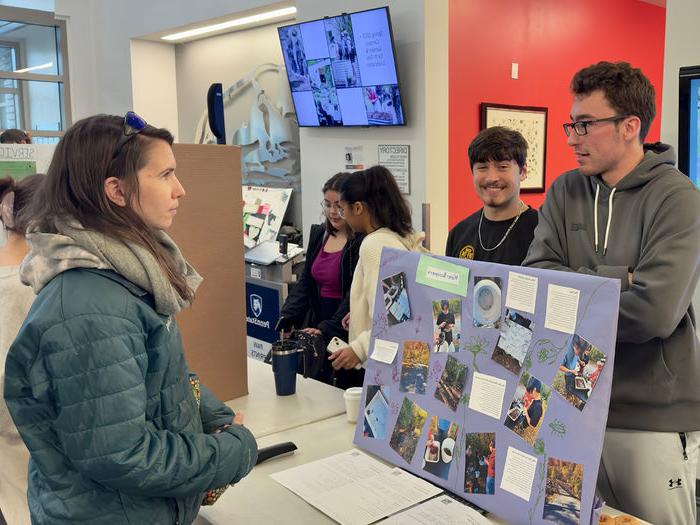 Students and community members viewed sustainability presentations. 