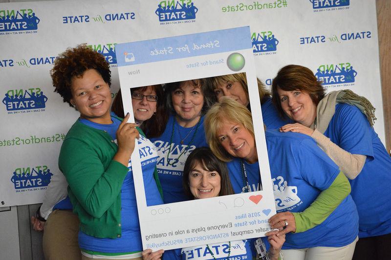 Staff pose for a photo