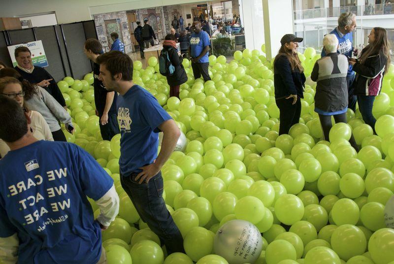 Students and staff talking in the Balloon Room 