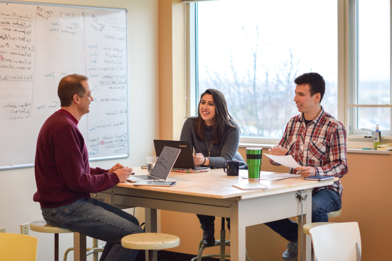 Chief Technology Officer Matt Woods (left), Chief Executive Officer Juan Mario Gomez (right) and intern Brenna McCornac