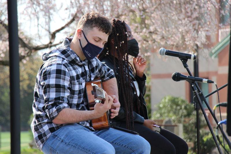Two students perform on stage at SpringFest, a musical event hosted by Berks Residence Life on April 23.