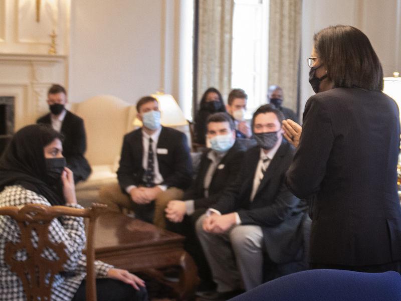 Neely Bendapudi, in the foreground, addresses a group of Penn State student leaders.