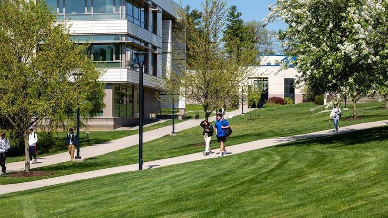 Photo of students walking on campus