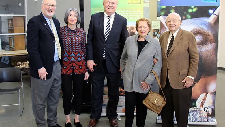 The Cohens and Hammels stand with Chancellor Hillkirk