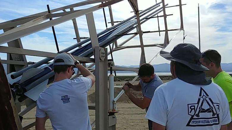 Odhner and his fellow engineers prepare to launch their rocket.