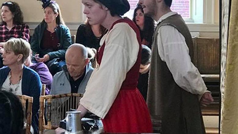 Students engaged in an interactive mock witch trial of Bridget Bishop.