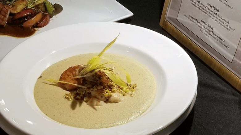 A bowl of corn and shrimp soup