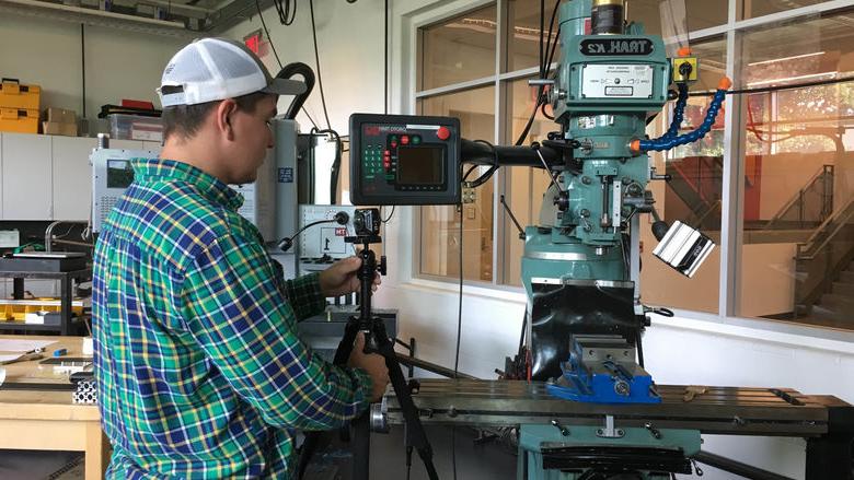 Wyatt Ritchie works in machine shop