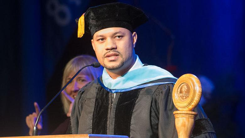 Man at podium