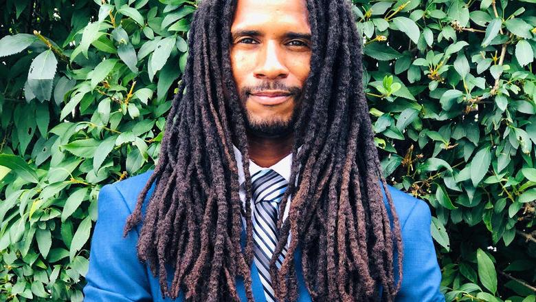 Headshot of Mike Africa Jr.