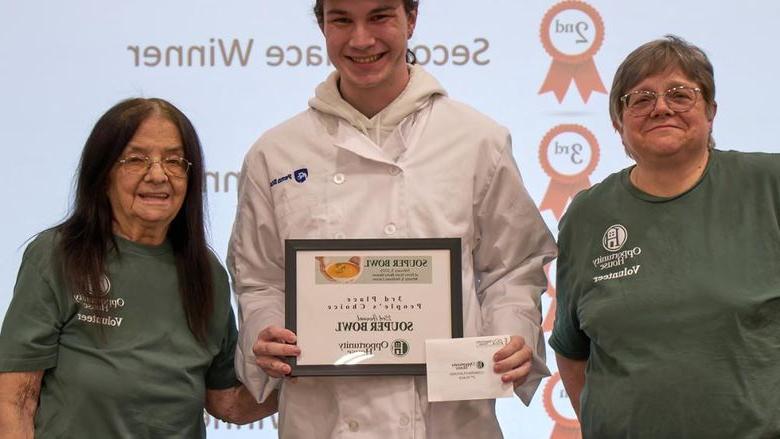 Student Souper Bowl winner is pictured with Food Services staff.