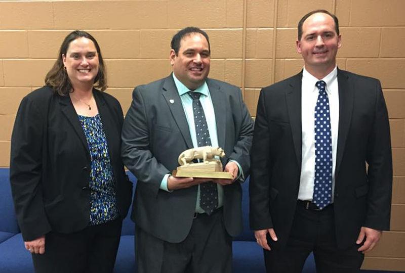 Jonathan Kukta (center) was recently honored with Penn State Schuylkill's Outstanding Alumnus Award. 