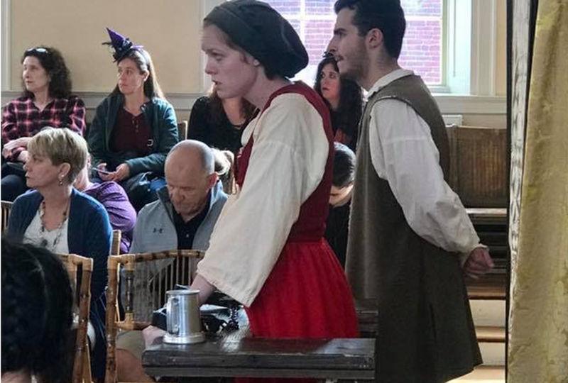 Students engaged in an interactive mock witch trial of Bridget Bishop.