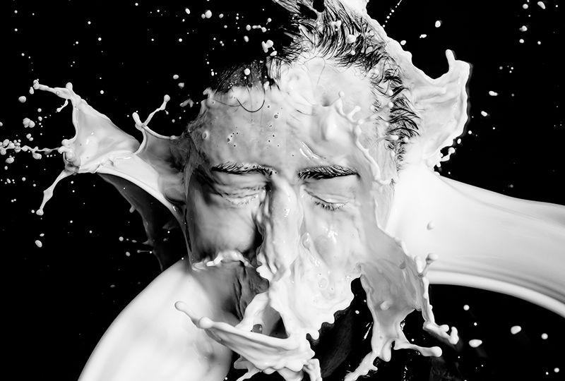 Splash of Milk Streams Impacting a Solid Surface