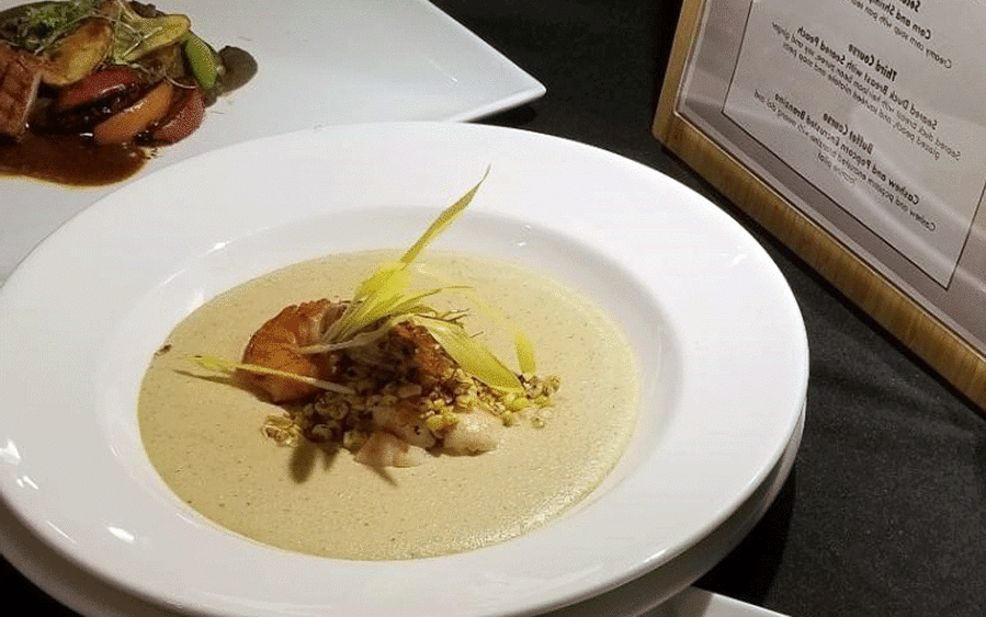 A bowl of corn and shrimp soup