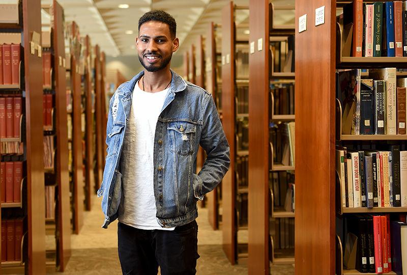 Rezene travels across the world to earn degree