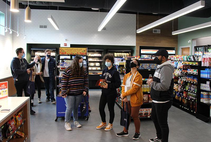 Student inside the newly open Creekside Market at Penn State Berks.