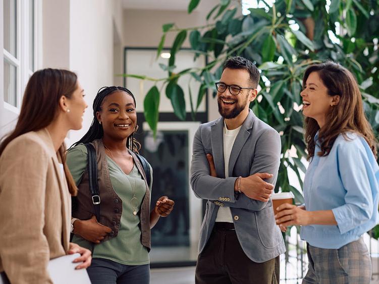 Group of young professionals talking