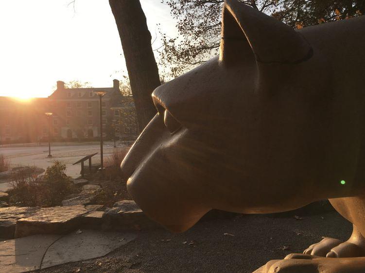 Sun rises over West halls near Shrine
