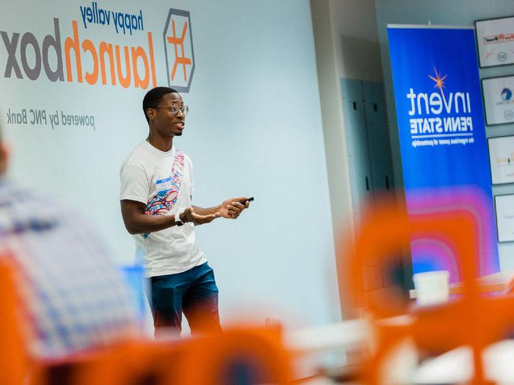 Student founder presenting his startup
